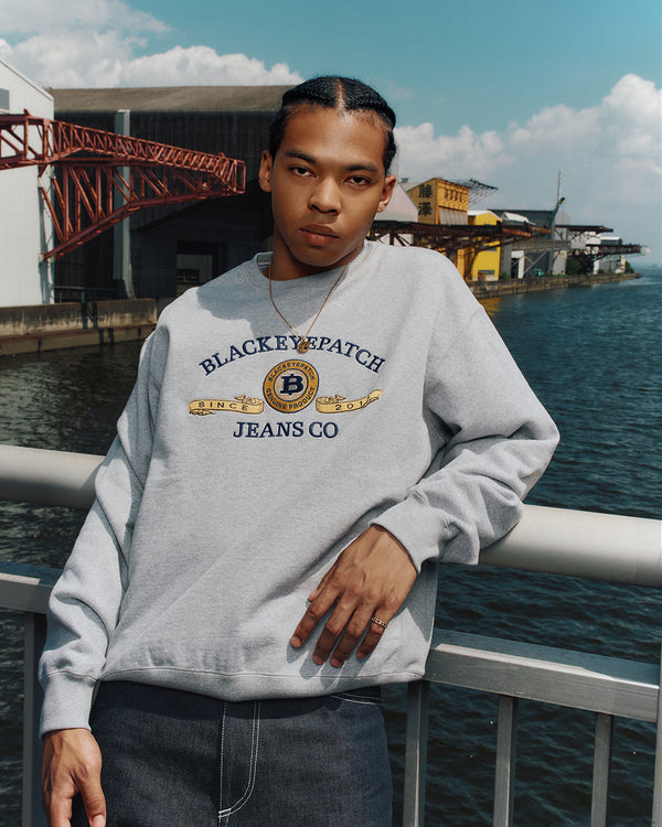 CURRENSY EMBLEM CREW SWEAT HEATHER GRAY