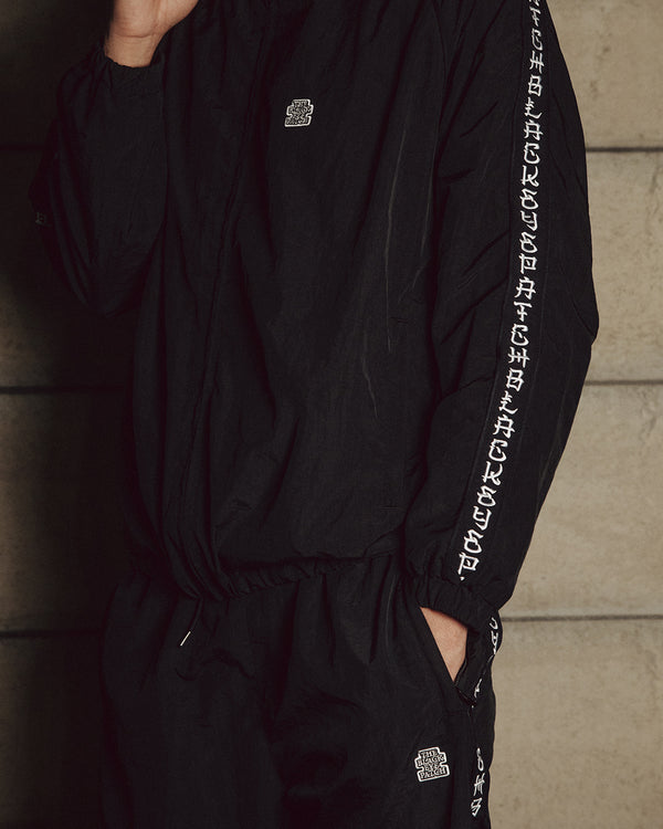 KANJI TAPED NYLON TRACK PANTS BLACK