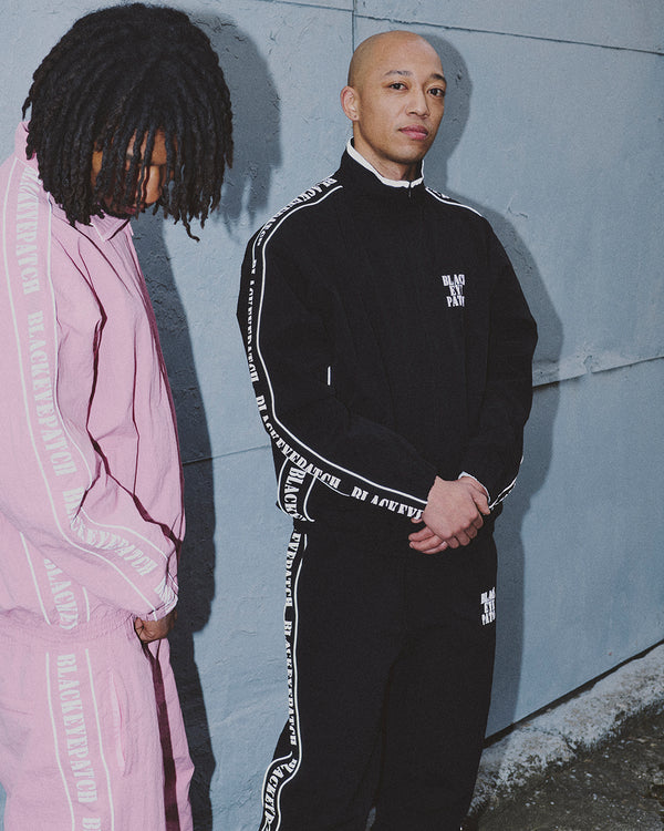 REFLECTIVE STENCIL LOGO TRACK JACKET BLACK