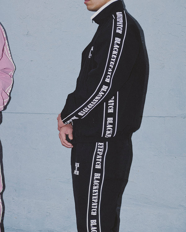 REFLECTIVE STENCIL LOGO TRACK JACKET BLACK